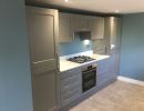 grey handled kitchen fitted by blue design ktichens