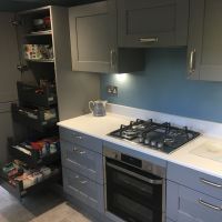 grey handled kitchen designed by blue design kitchens